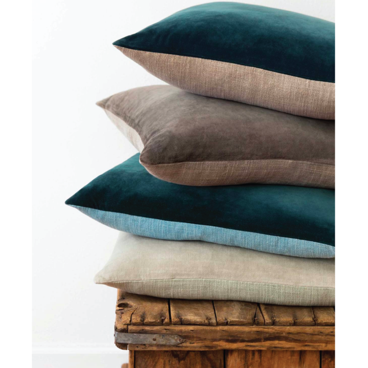 stack of lagoon two toned pillows